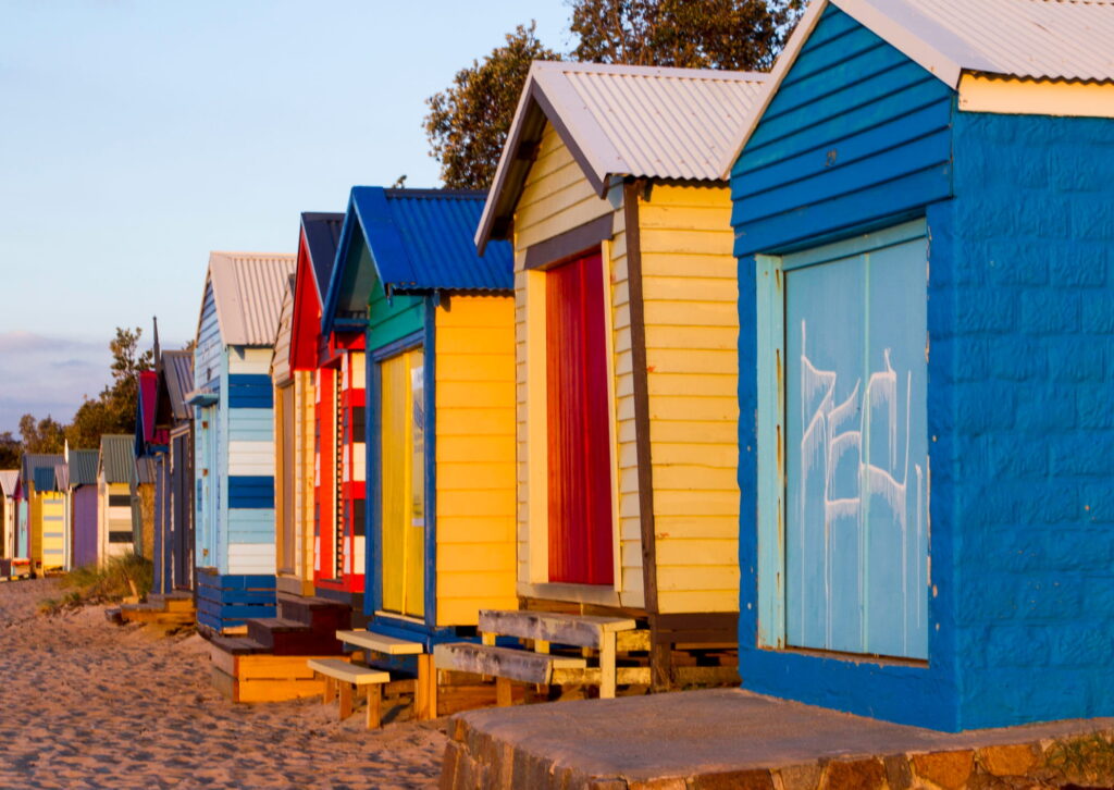 Dealing with asbestos at the beach, a photograph of colourful beach huts